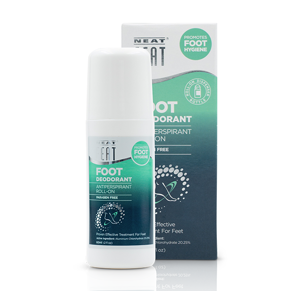 Neat Feat Roll-On Foot Deodorant in a white bottle with a green label and a white cap, with its packaging box displayed in the background.