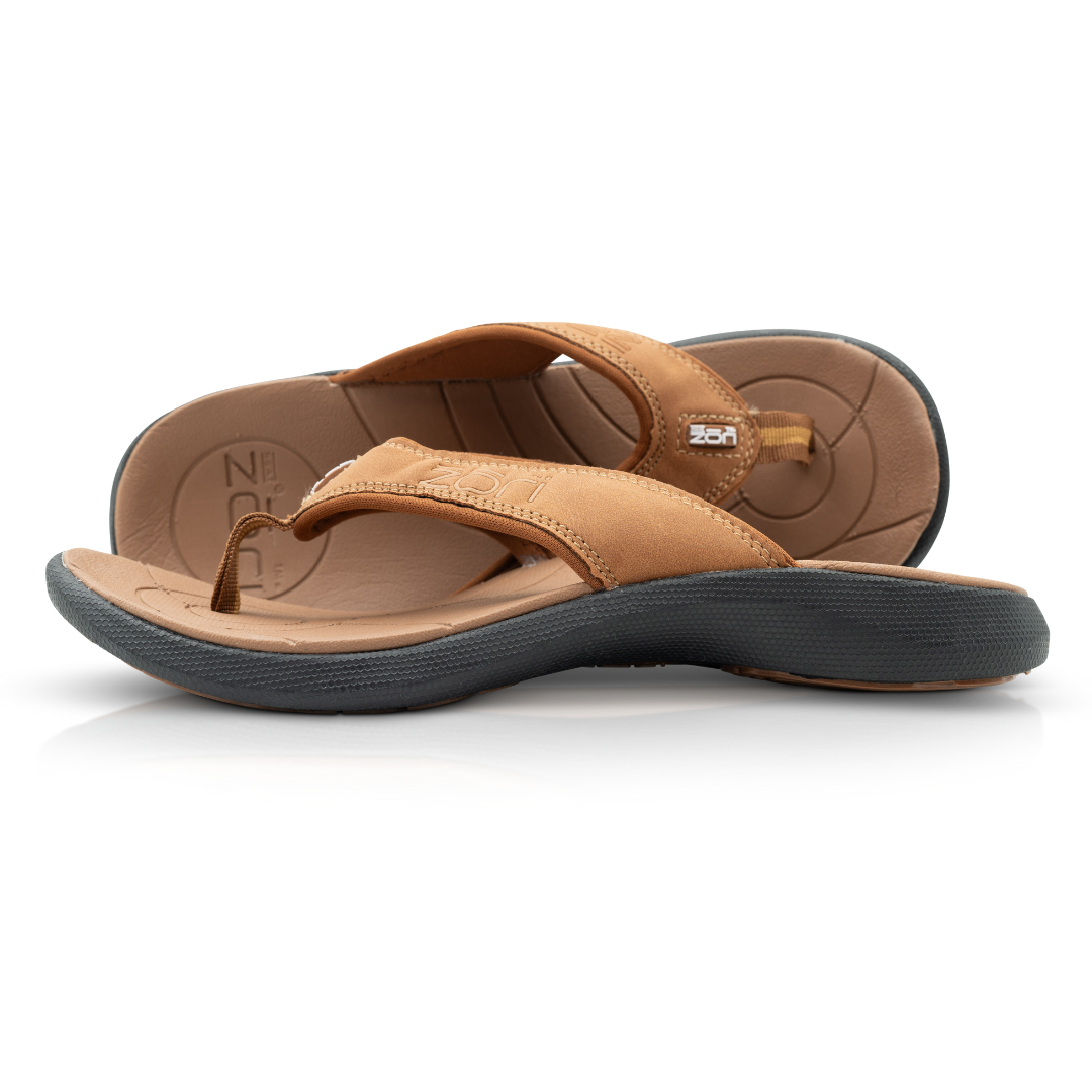 Neat Zori Cognac/Black Orthotic Sandals, one lying flat and the other on its side showing the top view, featuring a black underside, brown top, and straps.