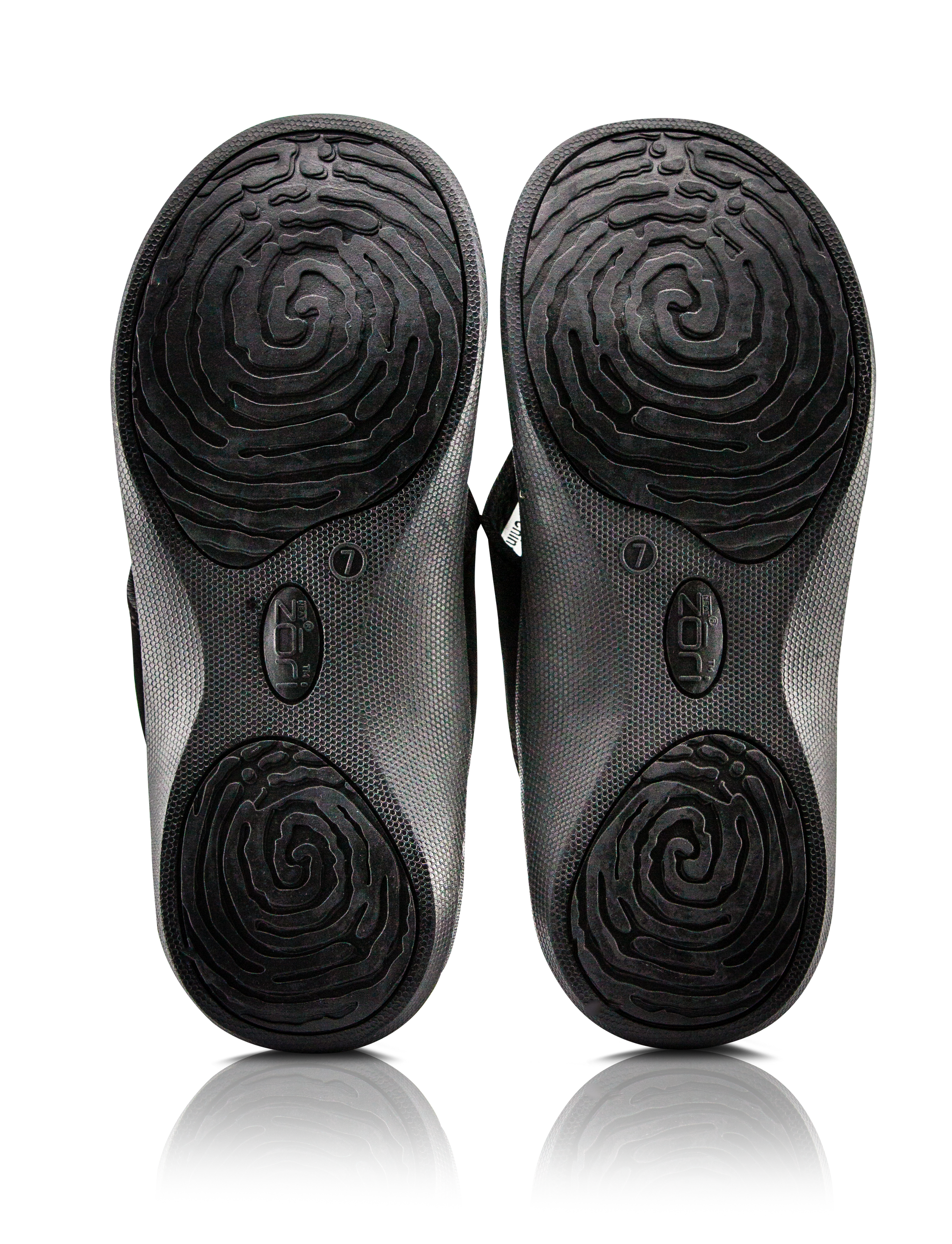 Neat Zori Black Orthotic Thong/Sandal, both flipped to show their underside, featuring grippy pads on the heel and front, displayed side by side.