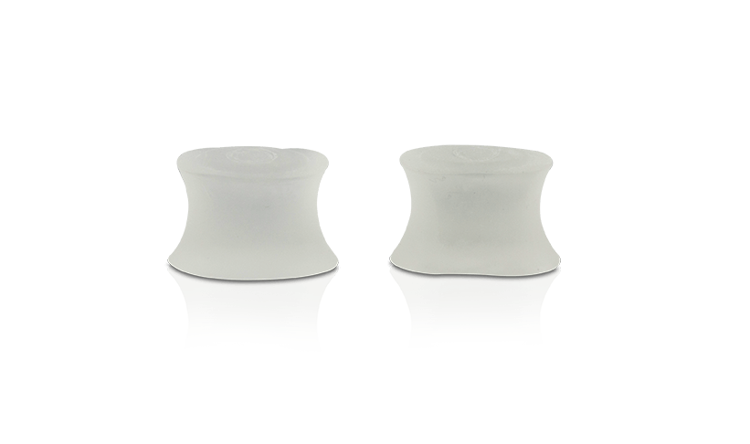 Neat Feat Gel Toe Spreaders, white with gel lining, designed to separate and align toes for added comfort.