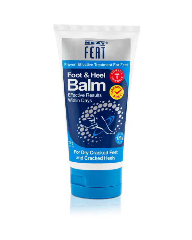 Neat Feat Heel Balm 120g tube for dry, cracked feet, in mostly navy blue packaging, featuring clear product information and a focus on hydration and repair for dry, cracked skin.